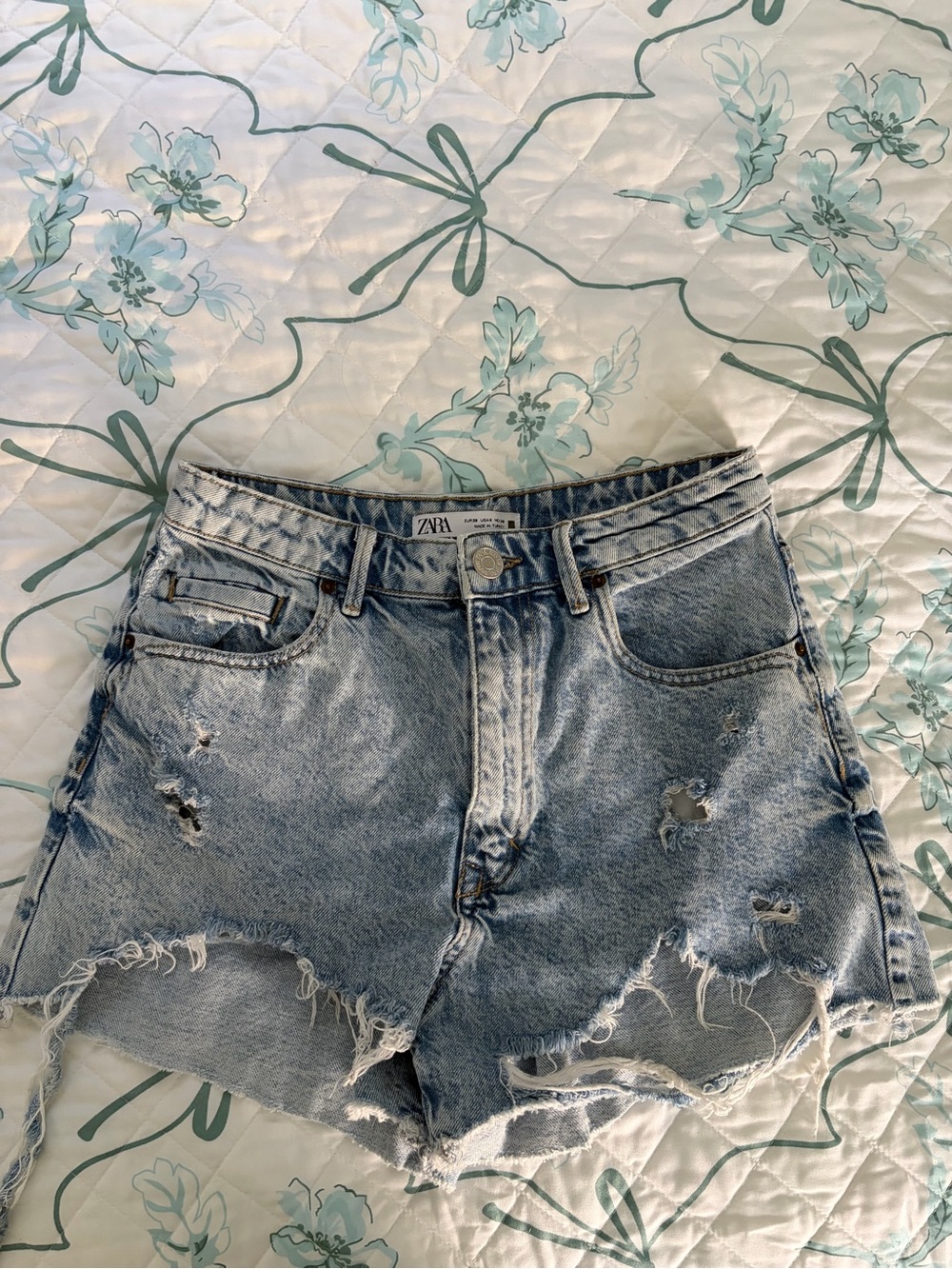 Zara Distressed High-Waist Denim Shorts in Light Blue Wash